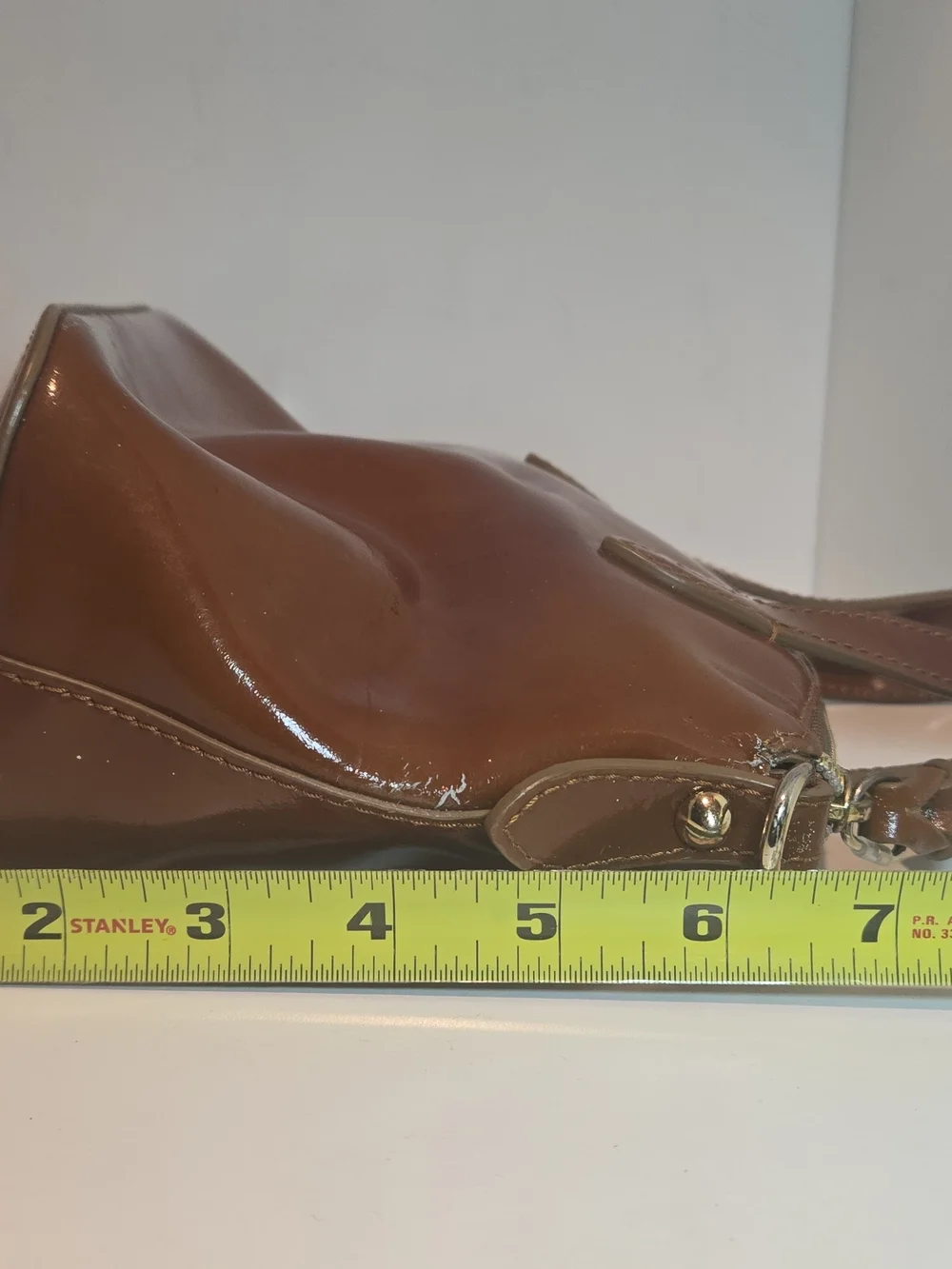 Dooney & Bourke Cognac Patent Leather Satchel with Gold Plaque